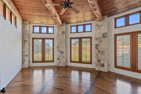 a kitchen with stainless steel appliances granite countertop a stove a sink and a granite counter tops