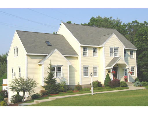 125 Stedman Street Chelmsford, MA 01824 - Photo 1 of 1 a front view of a house with a yard