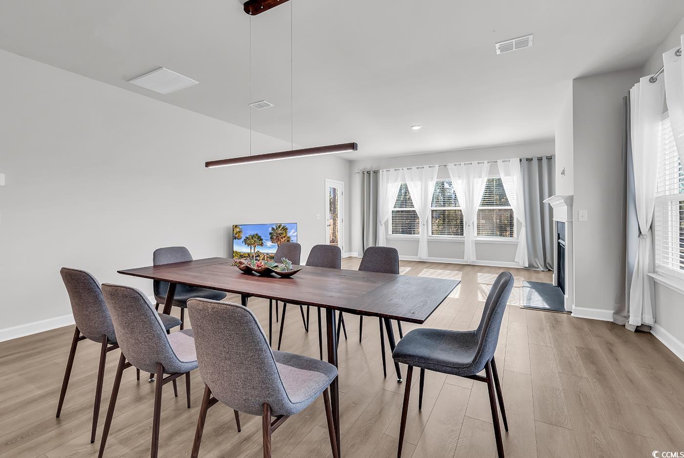 3104 Palma Way Myrtle Beach, SC 29579 - Photo 16 of 40 Dining room with baseboards and light wood-style flooring