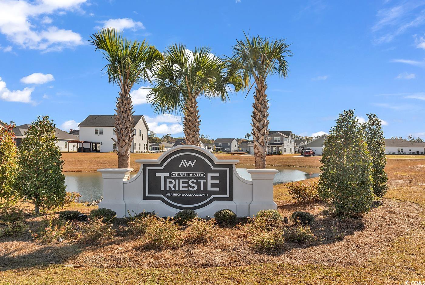 3104 Palma Way Myrtle Beach, SC 29579 - Photo 2 of 40 Community / neighborhood sign featuring a residential view and a water view