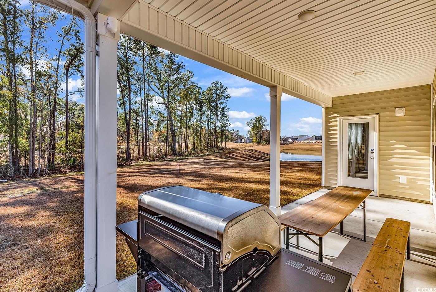 3104 Palma Way Myrtle Beach, SC 29579 - Photo 31 of 40 View of patio / terrace with a water view