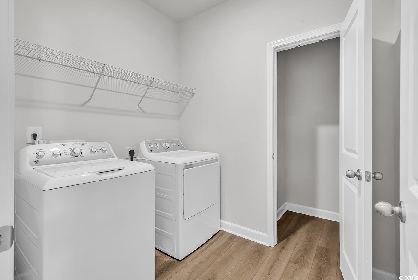 3104 Palma Way Myrtle Beach, SC 29579 - Photo 36 of 40 Laundry area with light wood-type flooring and independent washer and dryer