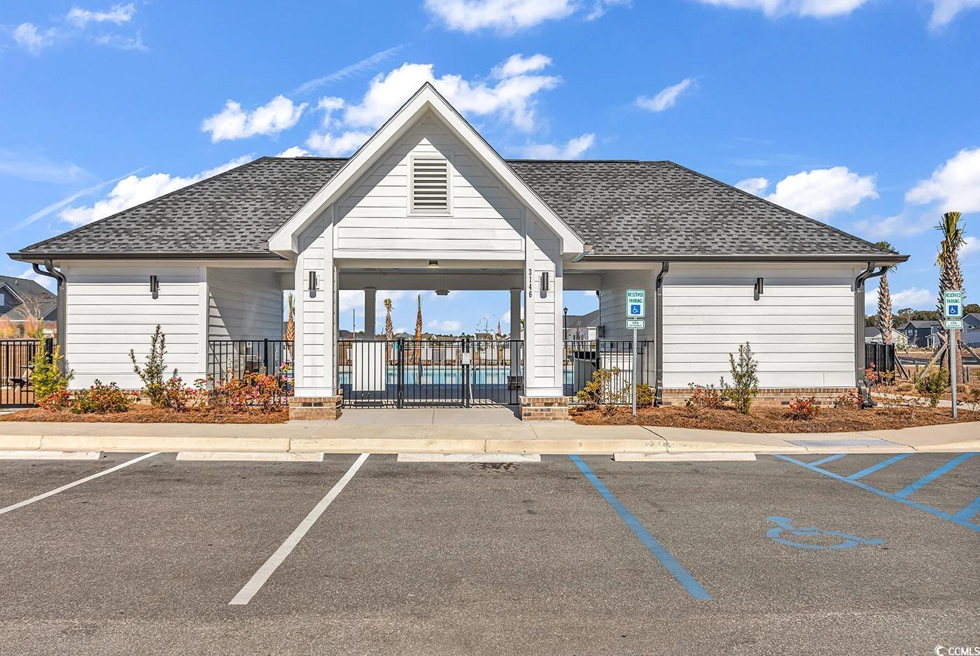3104 Palma Way Myrtle Beach, SC 29579 - Photo 37 of 40 View of building exterior featuring uncovered parking