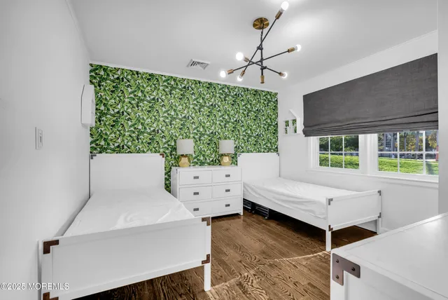 a workspace with furniture and wooden floor