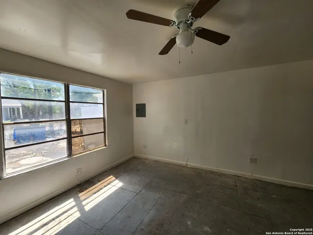 an empty room with windows