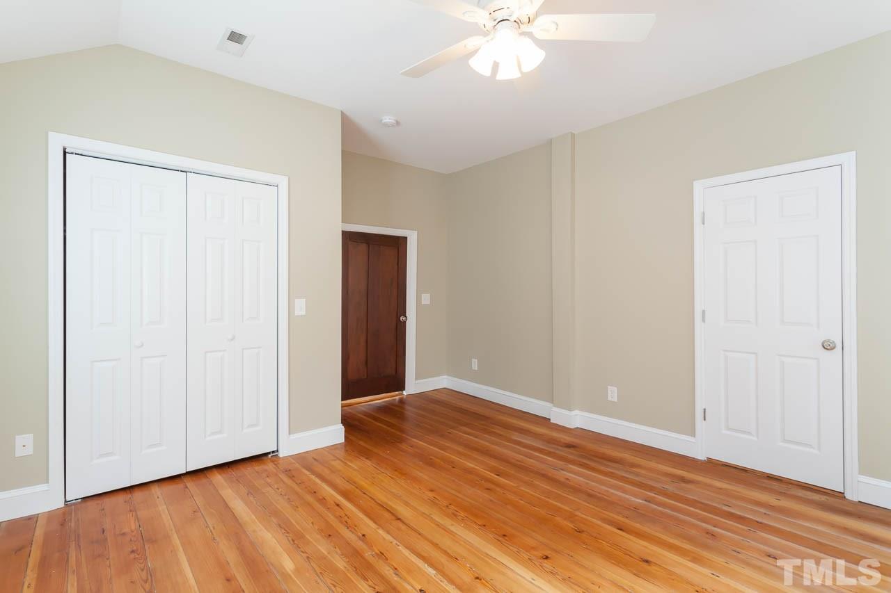 2333 Mt Vernon Church Road Raleigh, NC 27614 - Photo 16 of 24 a view of an empty room with wooden floor