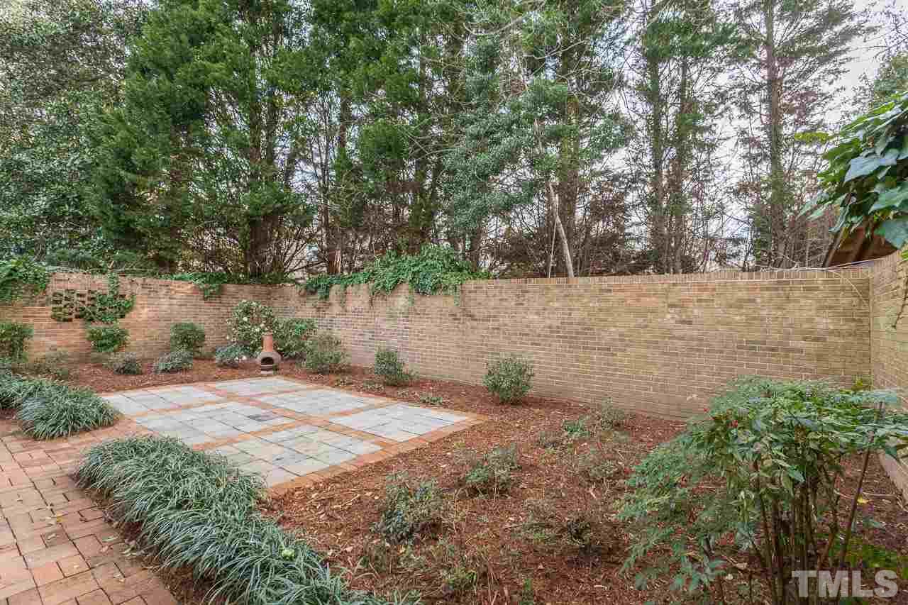 2333 Mt Vernon Church Road Raleigh, NC 27614 - Photo 18 of 24 a backyard of a house with lots of green space