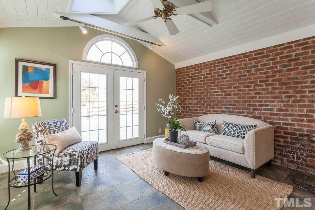 2333 Mt Vernon Church Road Raleigh, NC 27614 - Photo 3 of 24 a living room with furniture and a large window