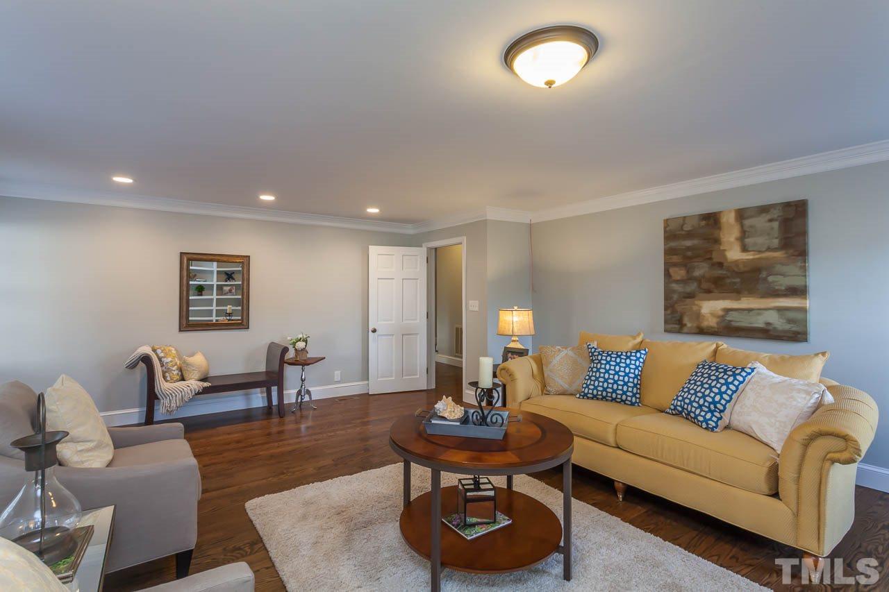 2333 Mt Vernon Church Road Raleigh, NC 27614 - Photo 10 of 24 a living room with furniture and a table