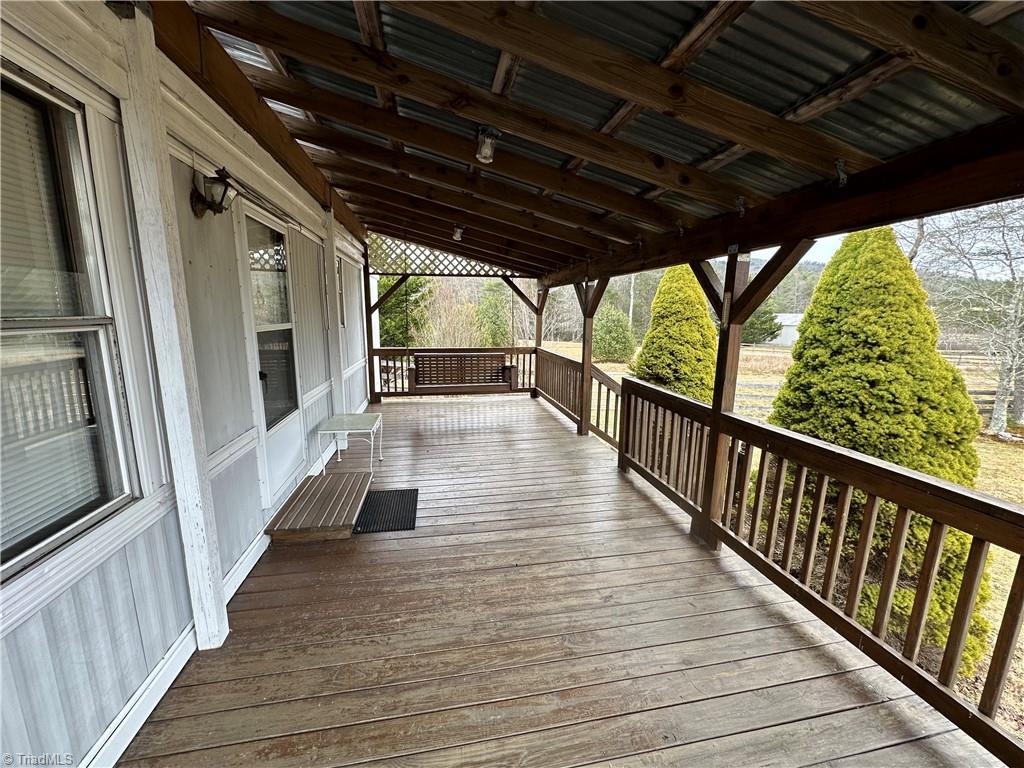 3661 Darnell Woodie Road Laurel Springs, NC 28644 - Photo 3 of 29 View as you enter the porch from the driveway
