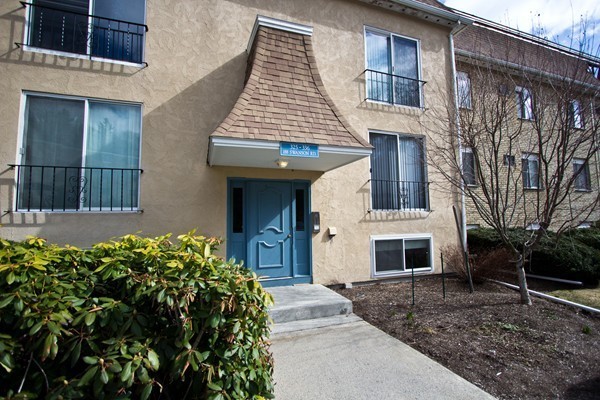 188 Swanson Road, Unit 326 Boxborough, MA 01719 - Photo 1 of 14 a front view of a house with garden