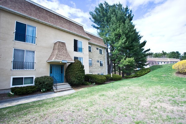 188 Swanson Road, Unit 326 Boxborough, MA 01719 - Photo 12 of 14 a view of a house with backyard