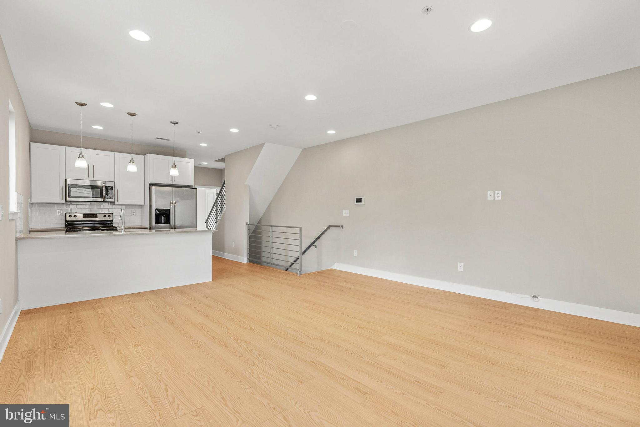 1238 North 6th Street, Unit B Philadelphia, PA 19122 - Photo 6 of 21 a view of large kitchen with stainless steel appliances