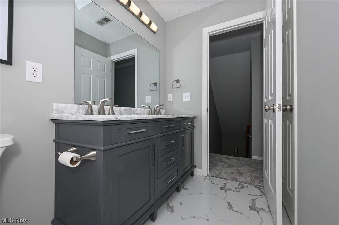 2468 Brainard Road Cleveland, OH 44124 - Photo 32 of 35 Upstairs Bathroom with Skylight