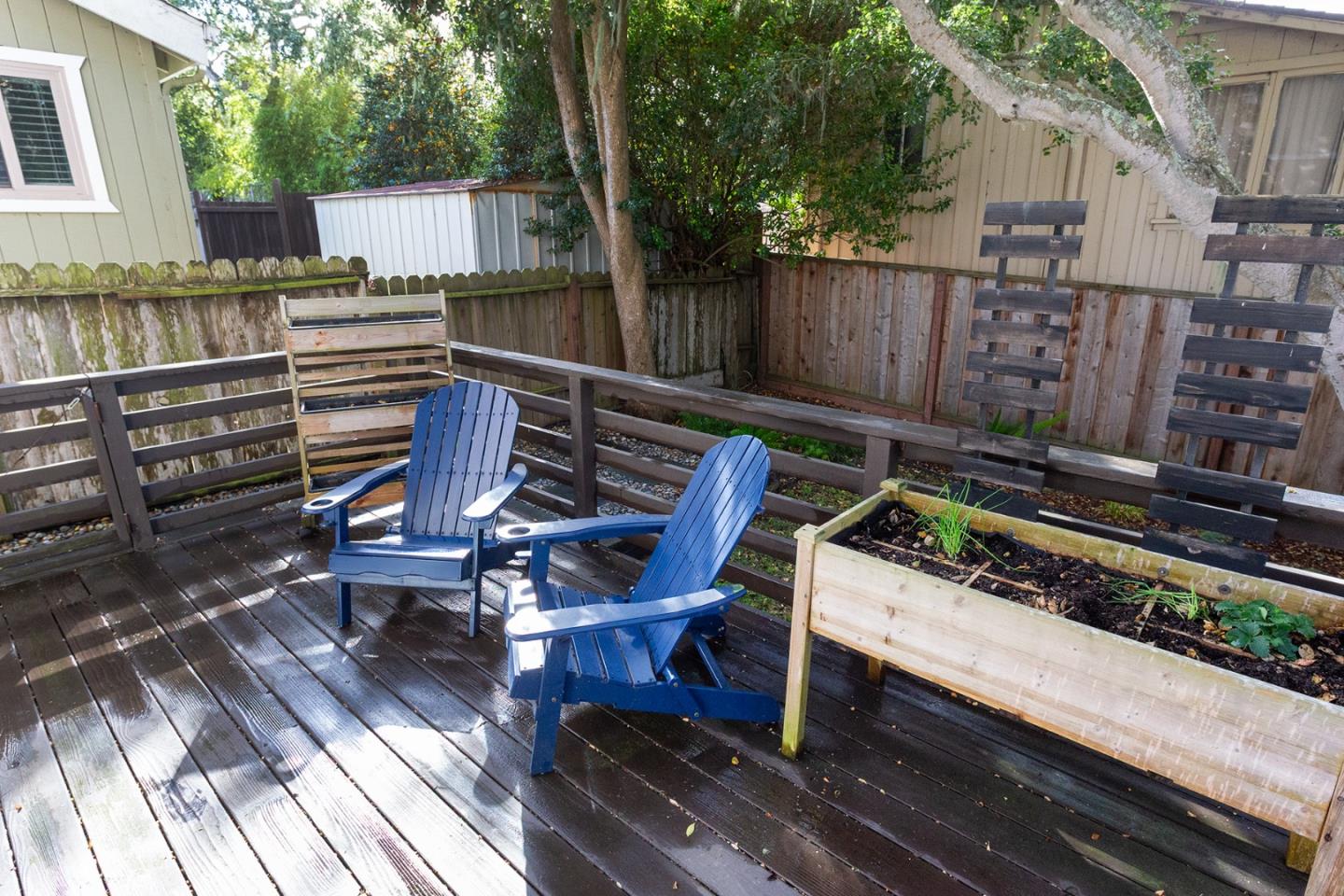 779 Alice Street Monterey, CA 93940 - Photo 25 of 27 a view of a chairs and table on the wooden roof deck