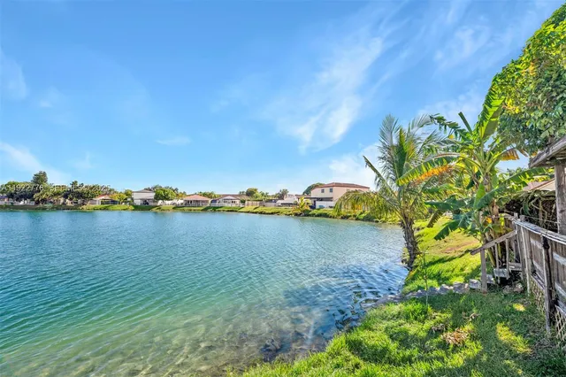 a view of a lake with houses