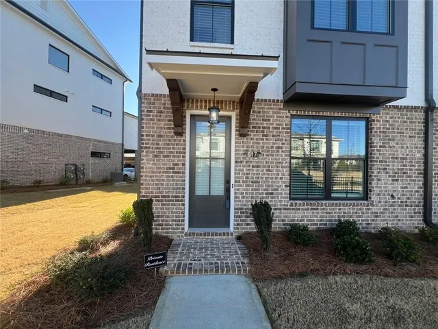 a view of a entryway door front of house