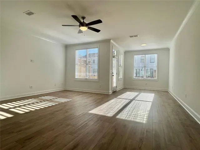 a view of an empty room and window