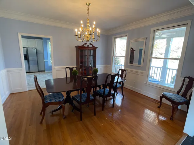 a bathroom with a double vanity sink a mirror and a shower