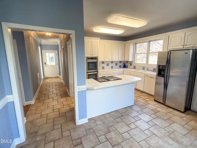 a bathroom with a toilet and a sink