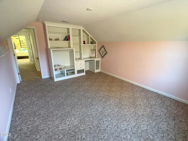a wooden bench sitting in wooden floor