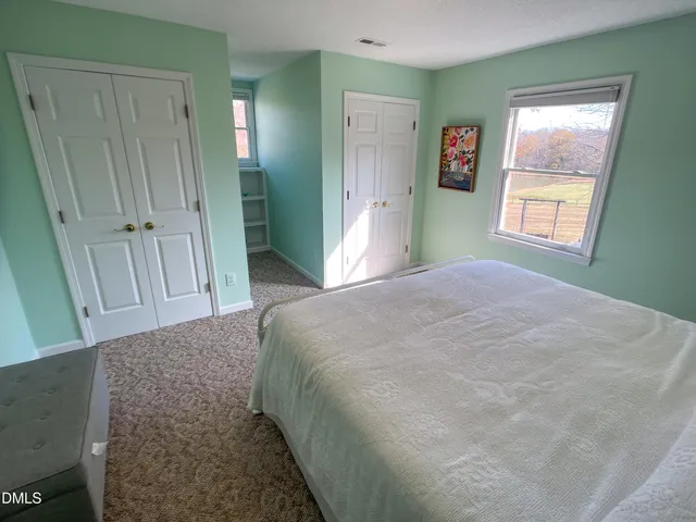 a view of kitchen and dining room with wooden floor