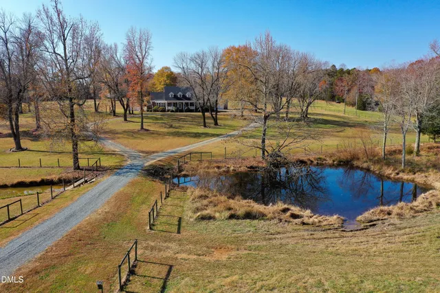 a view of a town with mountains in the background