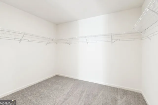 a view of a room with racks on the wall