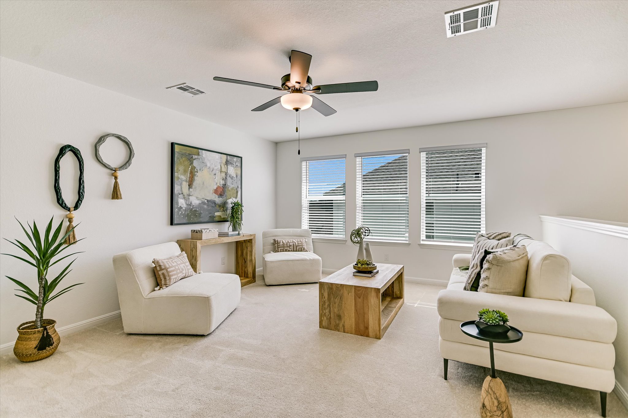 1928 Varese Path Leander, TX 78641 - Photo 11 of 31 The upstairs secondary living area is perfect for playing board games or letting the kids kickback with their friends. And, a quick tidy up before they leave is greatly appreciated!