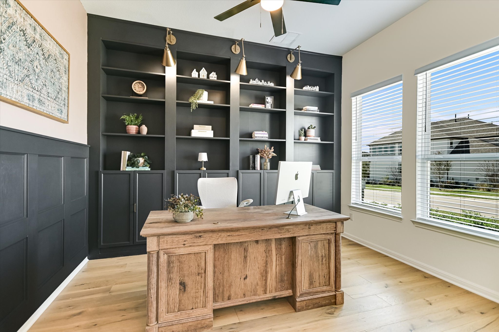 1928 Varese Path Leander, TX 78641 - Photo 3 of 31 Working from home just became much more productive in this comfortable space with large windows overlooking the front yard and built-ins that are functional as well as attractive.