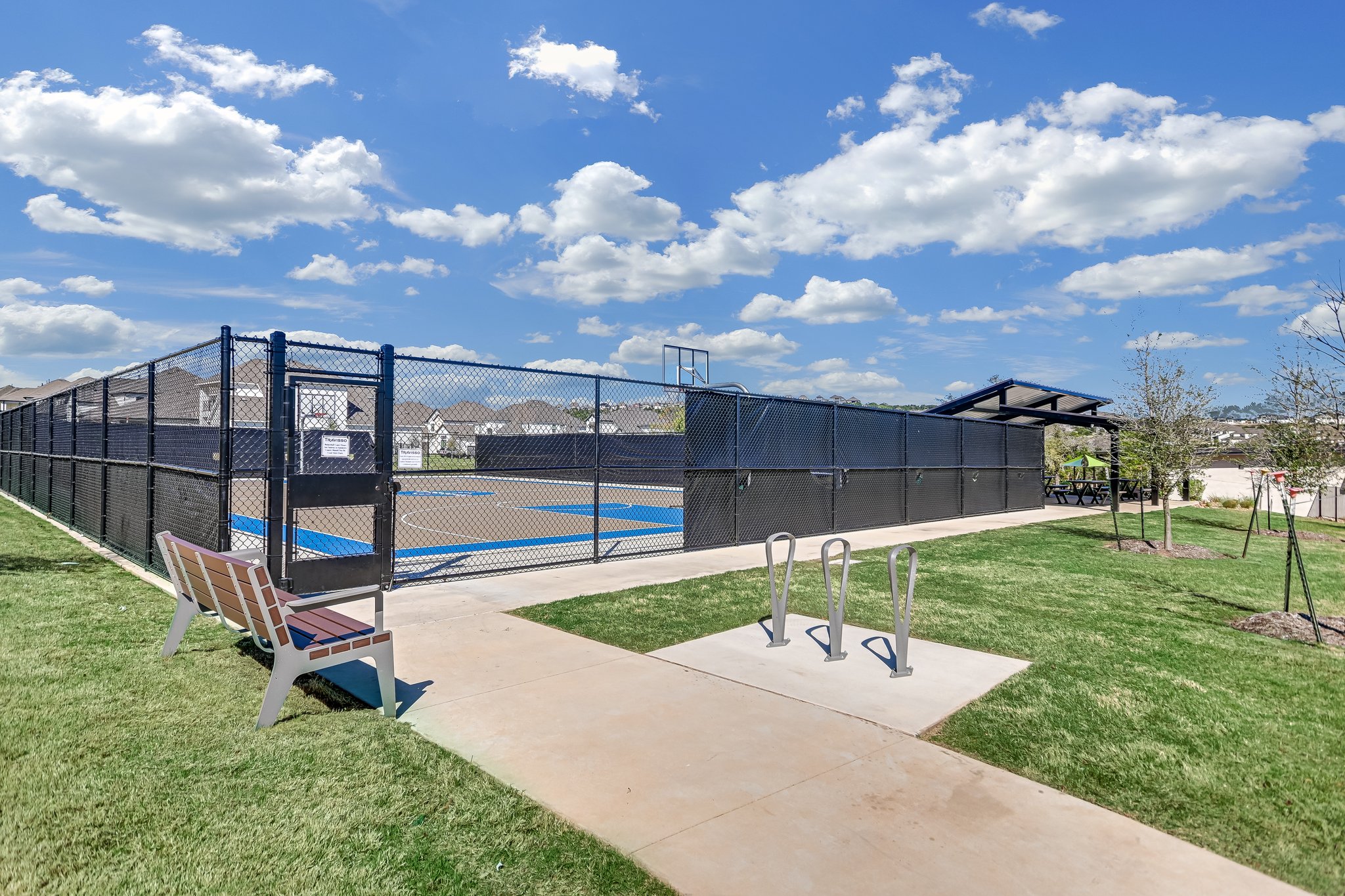 1928 Varese Path Leander, TX 78641 - Photo 28 of 31 Spend time on the basketball court shooting hoops or join a pickup game --- perfect for relaxed play or friendly neighborly competition.