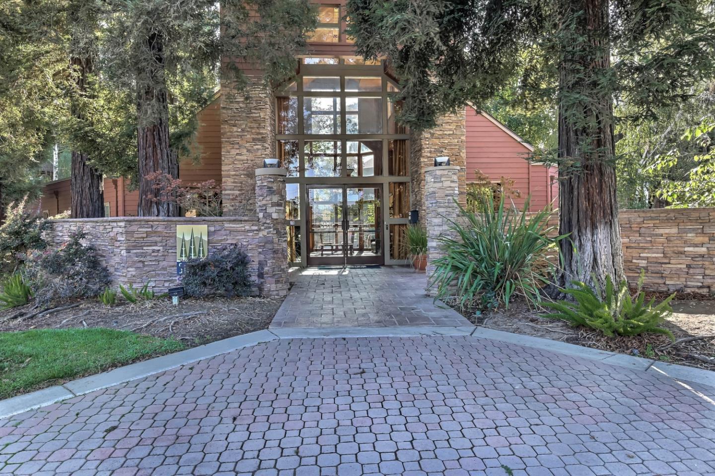 744 Teatree Court San Jose, CA 95128 - Photo 1 of 1 a front view of a house with a yard