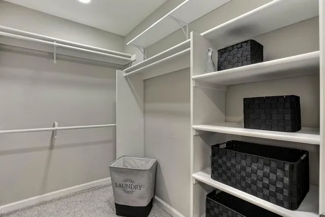 a kitchen with a stove and a microwave