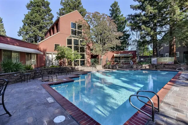 a view of a house with swimming pool