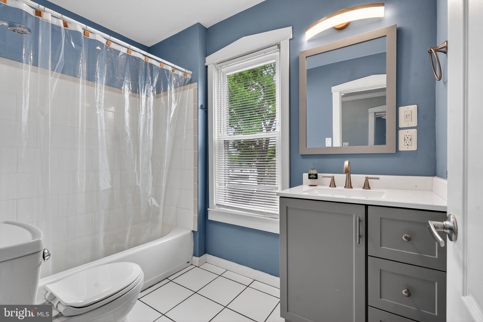 106 Ford Street Voorhees, NJ 08043 - Photo 24 of 36 a bathroom with a granite countertop sink toilet and mirror