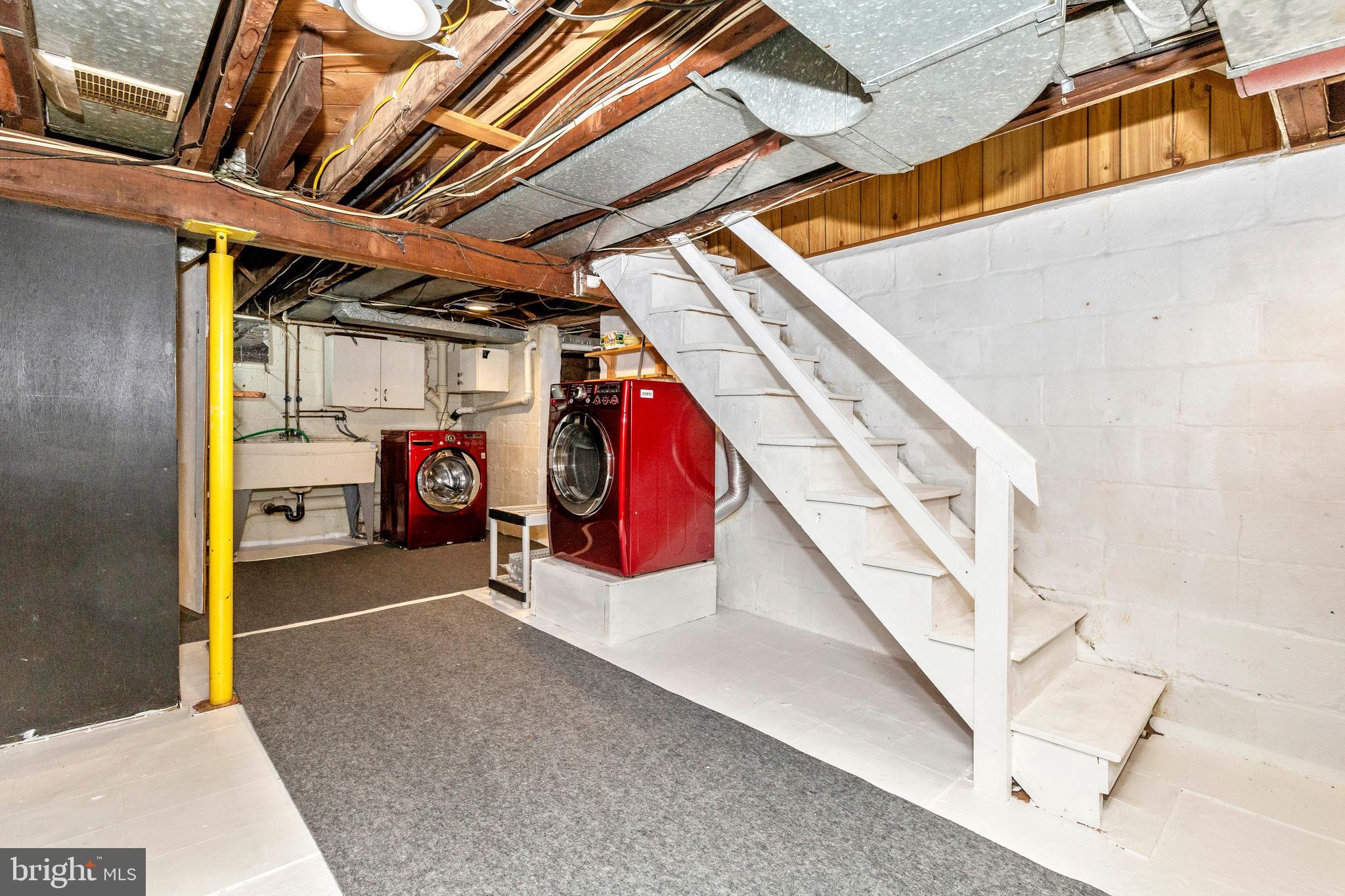 618 Sudbrook Road Baltimore, MD 21208 - Photo 28 of 40 Lower Level with Washer & Dryer & Exterior Exit