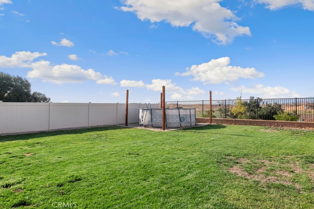 1148 Little Leaf Street Calimesa, CA 92320 - Photo 20 of 31 a view of a garden