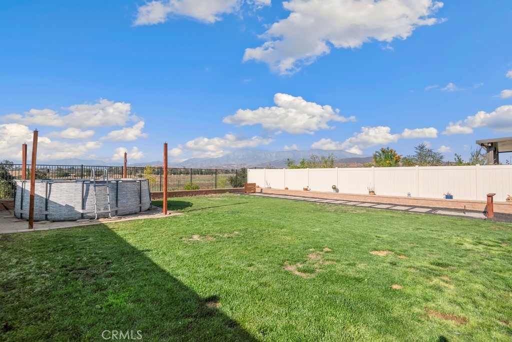 1148 Little Leaf Street Calimesa, CA 92320 - Photo 21 of 31 a view of a field with an ocean