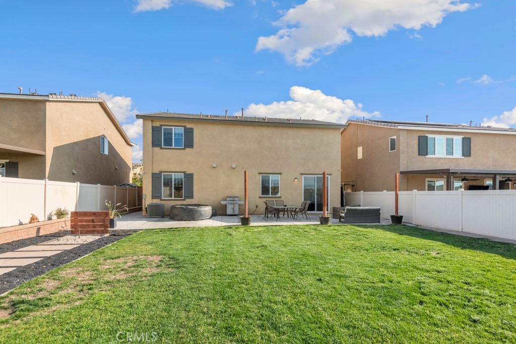 1148 Little Leaf Street Calimesa, CA 92320 - Photo 24 of 31 a house view with a sitting space and garden