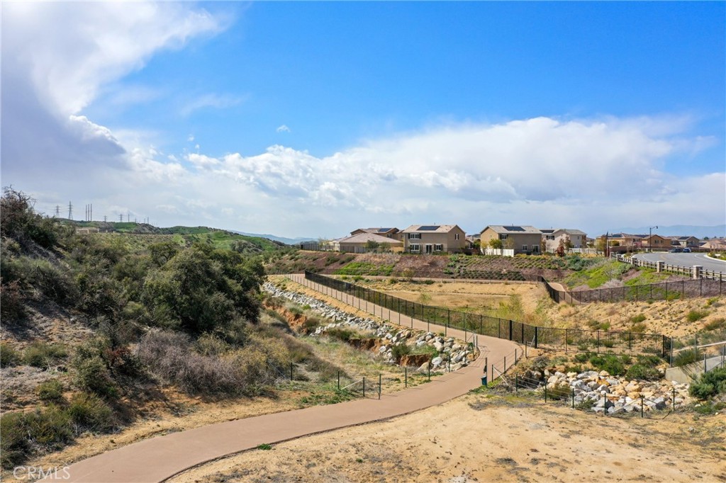 1148 Little Leaf Street Calimesa, CA 92320 - Photo 28 of 31 a view of a lake with mountains in the background