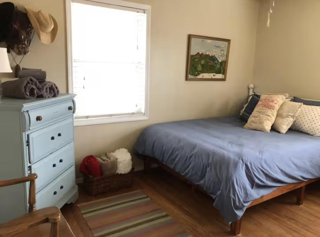 3621 31st Street Lubbock, TX 79410 - Photo 12 of 14 a bedroom with a bed and window