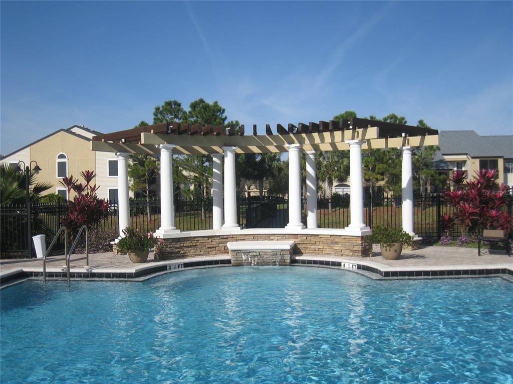 500 South Belcher Road, Unit 138 Largo, FL 33771 - Photo 19 of 31 a front view of a house with a garden