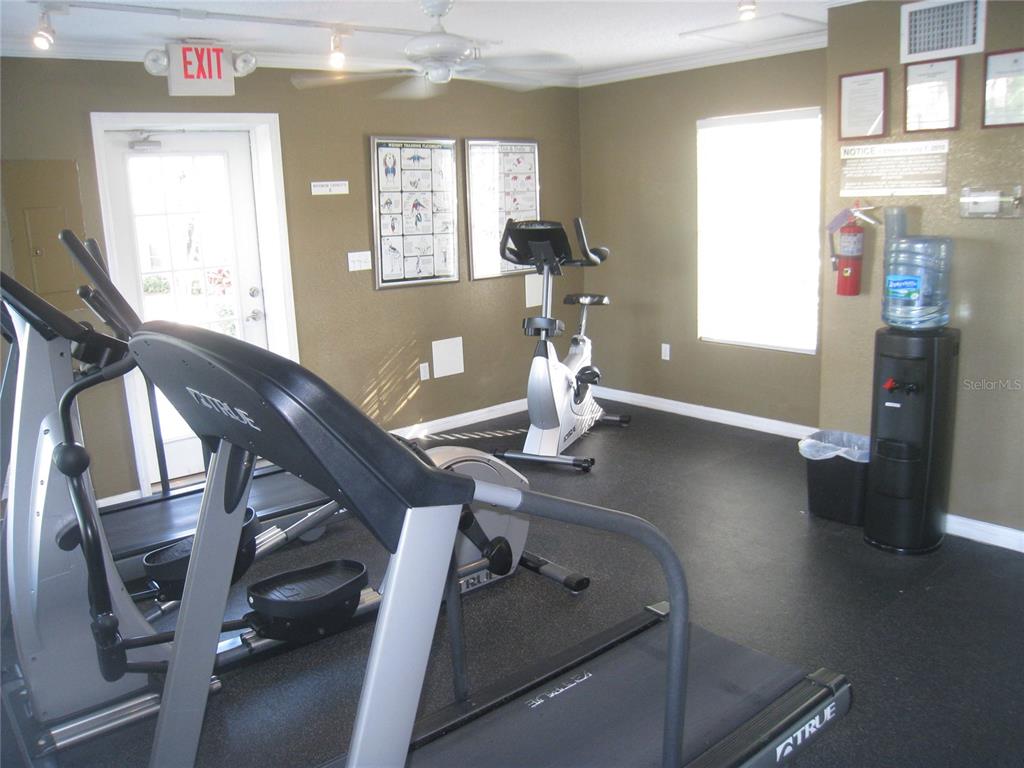 500 South Belcher Road, Unit 138 Largo, FL 33771 - Photo 20 of 31 a living room with furniture and wooden floor