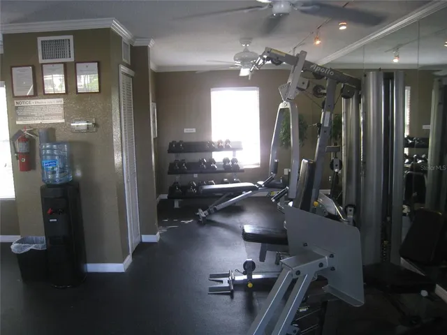 a view of a room with gym equipment