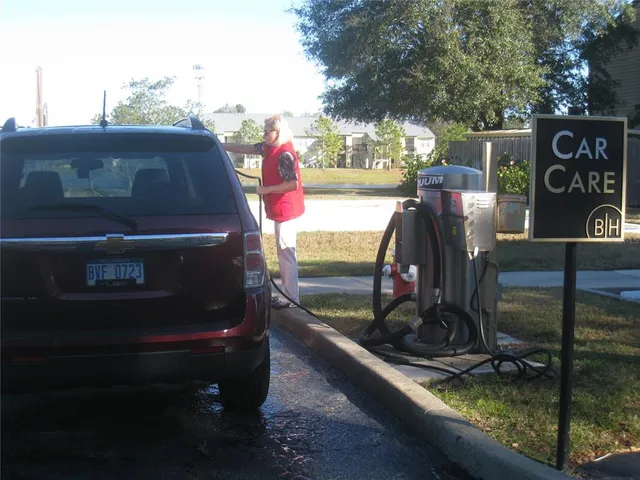 a view of a chair and table in the patio