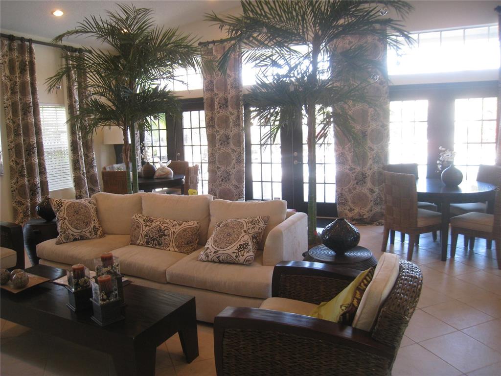 500 South Belcher Road, Unit 138 Largo, FL 33771 - Photo 30 of 31 a living room with furniture and a large window