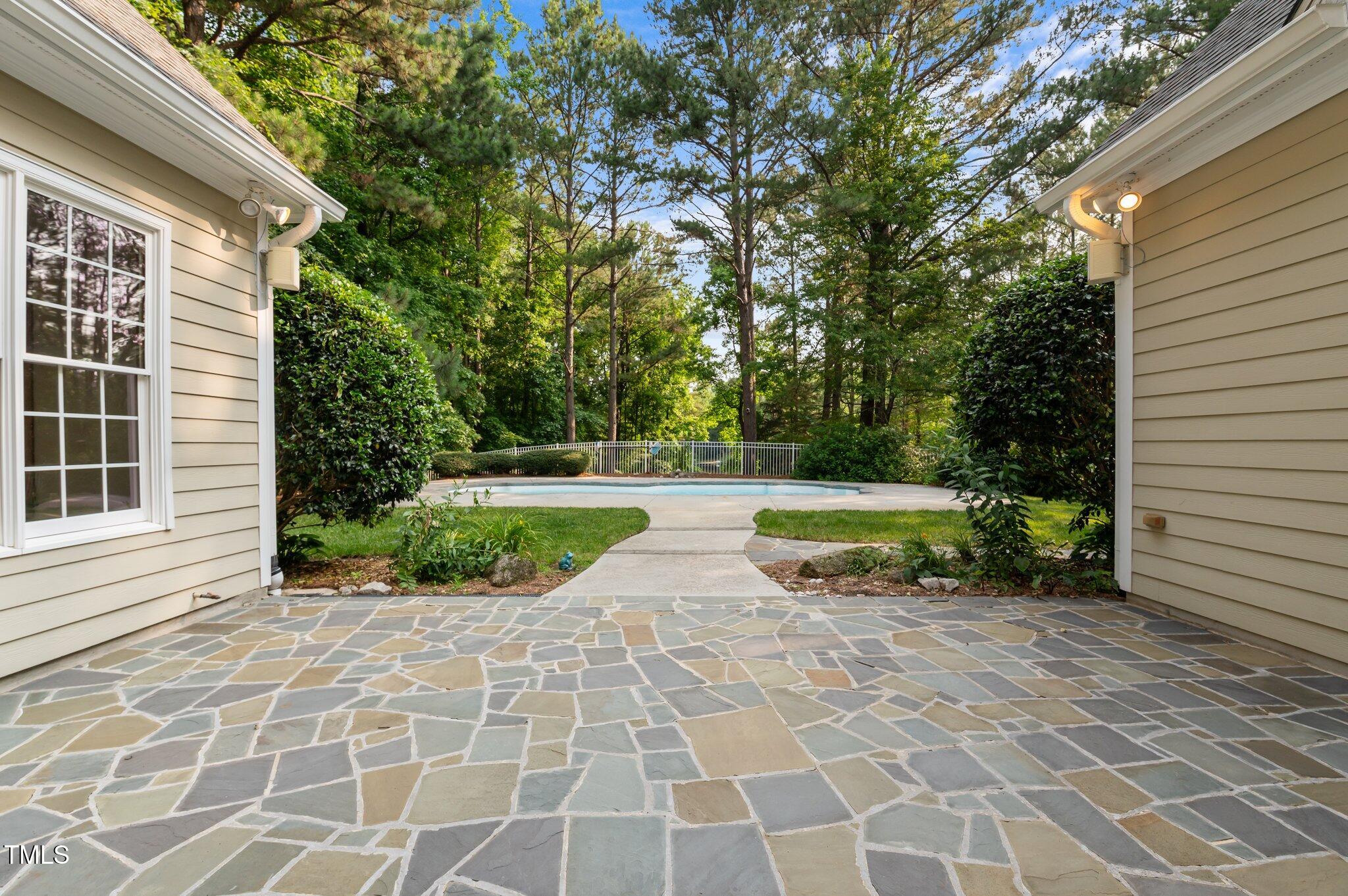 5344 Mill Dam Road Wake Forest, NC 27587 - Photo 4 of 68 a view of a house with backyard and sitting area
