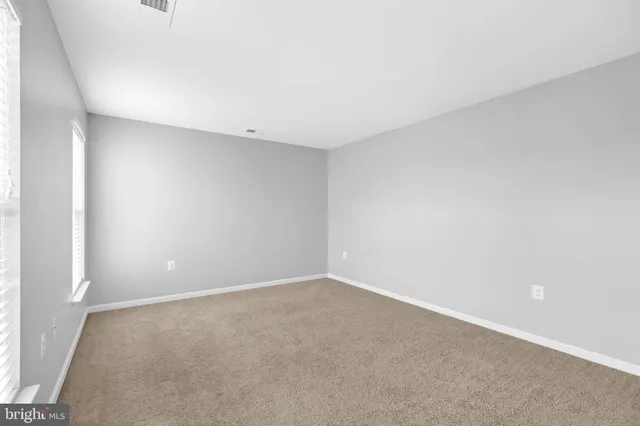 an empty room with an entryway