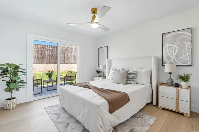 a bedroom with a bed and a table