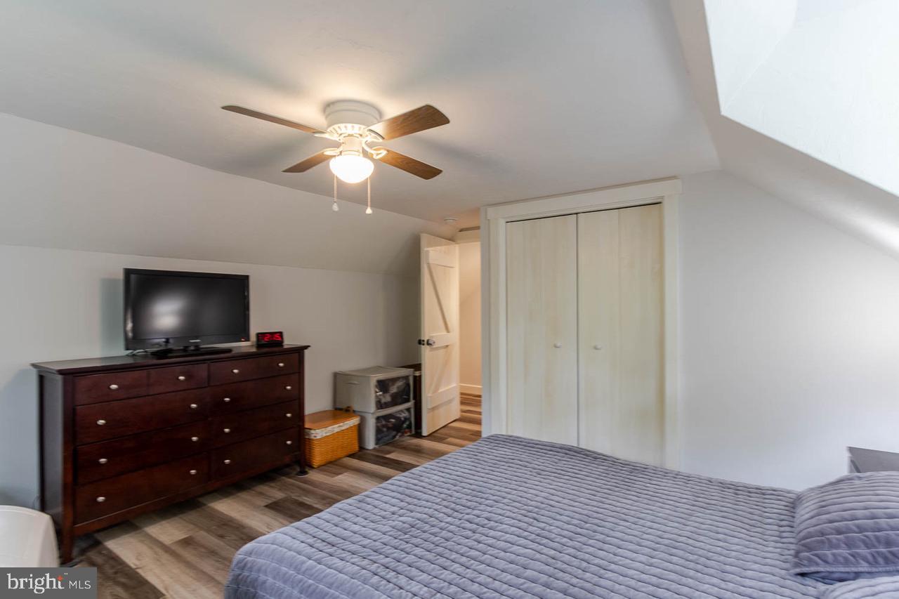 1834 Decker Hollow Road Tyrone, PA 16686 - Photo 30 of 40 a bedroom with a bed and a flat screen tv